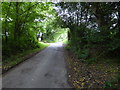 Unnamed lane signposted at both ends as "Narrow Road"