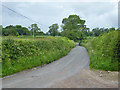 ST6822 : Lane north from Stowell church and farm by Robin Webster