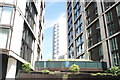 View of a block of flats on Harbet Road from Floating Pocket Park in the Paddington Basin