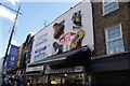 View of shoe sculptures on the front of a Converse store on Camden High Street