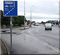 Partly symbolic, partly bilingual sign facing Newport Road, Cardiff