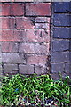 Benchmark on Humberstone Road railway bridge