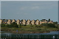 View of houses in the new Gunners Park development from the coastal path next to Barge Pier