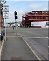 Two bilingual signs on a Newport Road corner, Cardiff