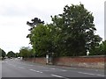 Bus shelter by the wall of Colchester cemetery