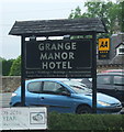 Sign for the Grange Manor Hotel