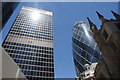 View of the Aviva building and Gherkin from St. Mary Axe