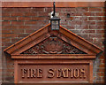 Old fire station sign in terra cotta, Salisbury