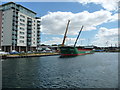 Unloading sawn timber at Eagle Wharf, Ipswich