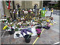 Flowers and candles outside Notting Hill Methodist Church