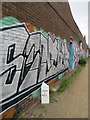 Leeds-Liverpool Canal milepost and graffiti, north of Boundary Road, Liverpool