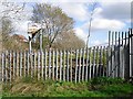 Fence and old sign at former landfill site