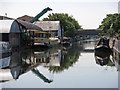 The Grand Union Canal south of the Rockingham Road bridge (no.186)