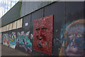 Art work on the peace line, Cupar Way, Belfast