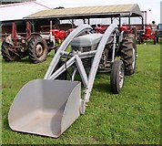 TG1823 : Top loader on TEF 20 tractor by Evelyn Simak