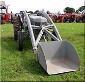 TG1823 : Top loader on TEF 20 tractor by Evelyn Simak