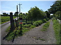 Old railway track and road, looking west