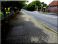 Manhole covers along Melmount Road