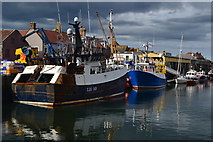 NT9464 : Fishing boats in Eyemouth Harbour by David Martin