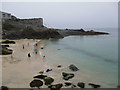 SW5240 : Beach  and  rocks  north  of  St  Ives  harbour by Martin Dawes