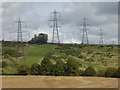 SP0515 : Electricity pylons above Cassey Compton by Philip Halling