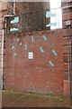 Wall between two tenements