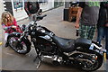 View of a classic motorbike in Greenwich Market for the Mean Old Timers meet-up