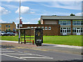 TQ5491 : Harold Hill Community Centre bus stop by Robin Webster