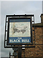 Sign for the former Black Bull pub, Kirkoswald