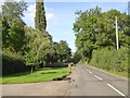 SP5759 : Road into Newnham crossing River Nene by David Smith