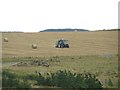 NZ2294 : Baling straw on former opencast land at Stobswood by Graham Robson
