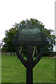 TF7815 : West Acre Village sign by Geographer