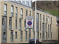 NT2673 : Deaconess Hospital, Salisbury Crags and parking signs by David Hawgood