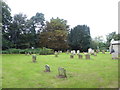 TF9700 : Holy Trinity, Scoulton: churchyard (i) by Basher Eyre