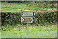 TF8113 : Roadsigns on the A1065 Main Road by Geographer