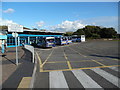 SS7690 : Three Buses and a Coach in Port Talbot Bus Station by David Hillas