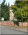 The entrance to the churchyard from Pirton Road, Holwell