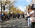 SJ8498 : Piping down Piccadilly  by Gerald England
