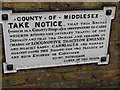 Old notice on a bridge