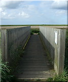 TG0444 : Foot bridge over drain, Cley next the Sea by JThomas