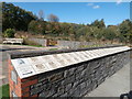 Memorial wall in the Welsh National and Universal Mining Memorial Garden, with names of victims of the 1901 Universal Colliery d