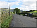 Road (B818) at the entrance to Overton