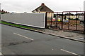 Fenced-off demolition site in Maesglas, Newport