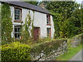 J1809 : Derelict farmhouse in Irish Grange by Eric Jones