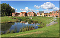 SP3682 : Surface water pond in open space for new housing, Wood End, north Coventry by Robin Stott