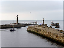 NZ9011 : The Piers at Whitby by David Dixon