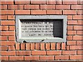 Tablet on house wall in Whitby