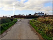 J2005 : Junction on a bend in the Templetown Road by Eric Jones