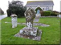 Celtic cross and milestone at Crows-an-wra