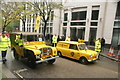 View of an AA Morris 1000 van and Jeep in the Lord Mayor